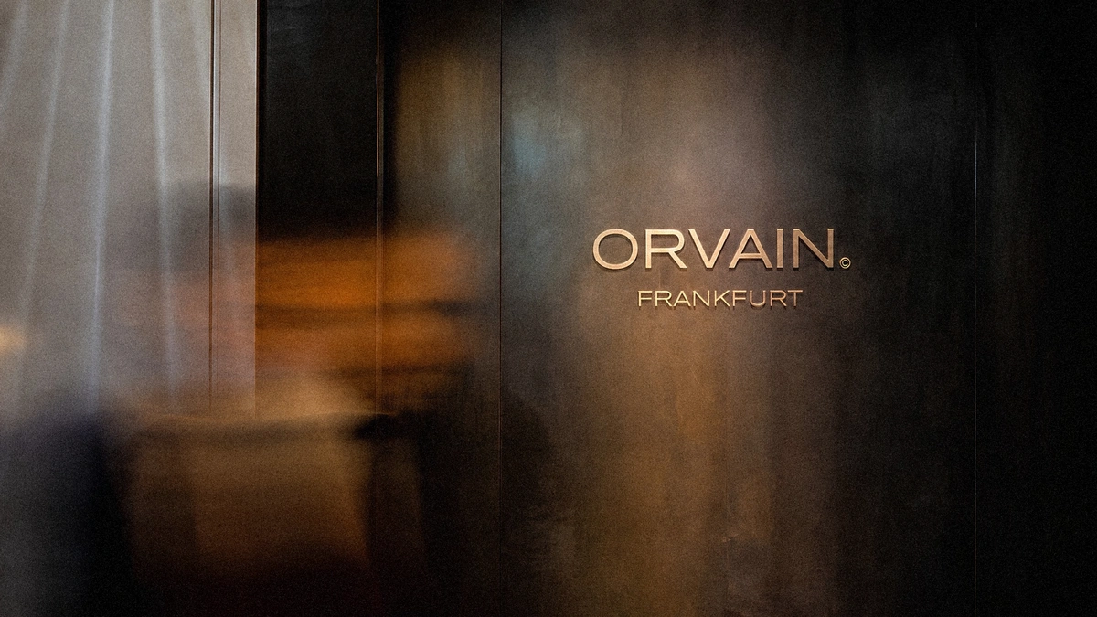 The ORVAIN Frankfurt lettering on a dark, patinated wall